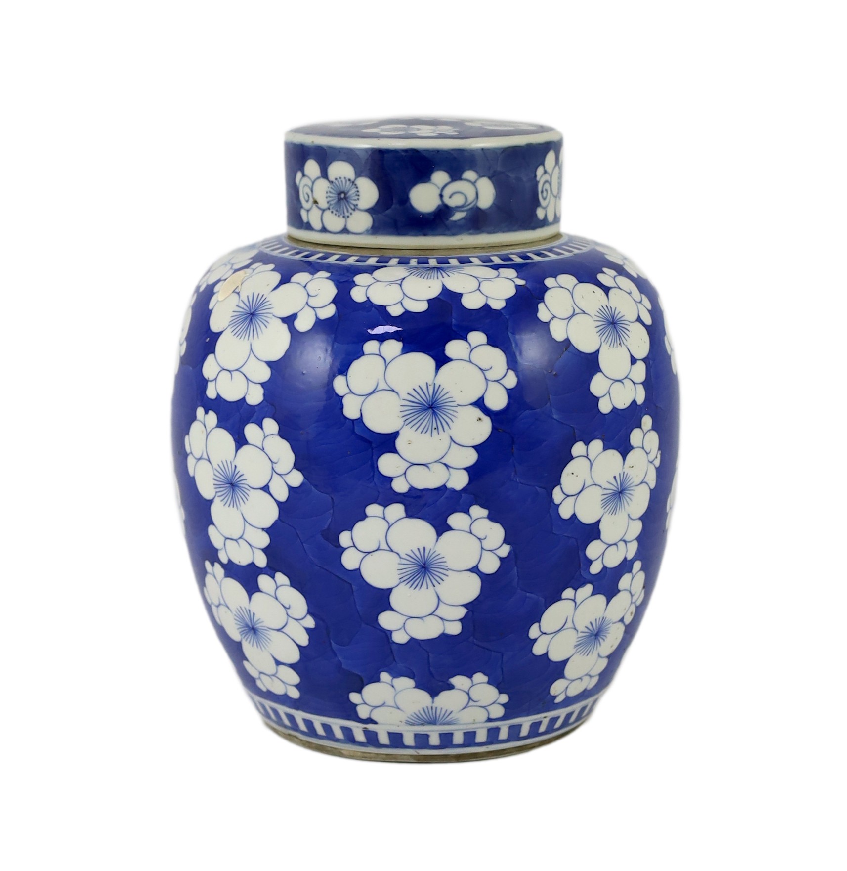 A Chinese blue and white prunus jar and cover, 19th century, 25cm high, cover associated